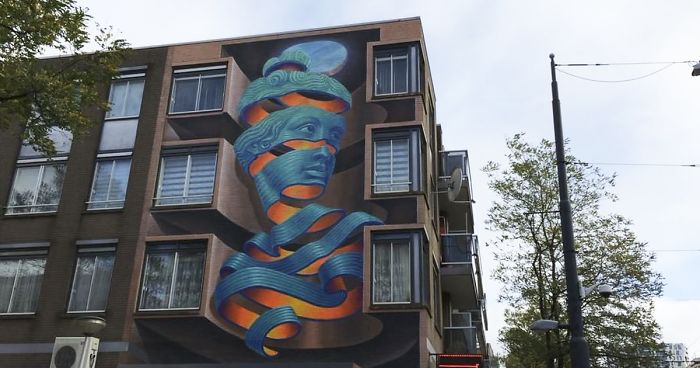 Artist Creates Large Scale Street Art Murals Across Europe, Makes Boring Buildings Interesting
