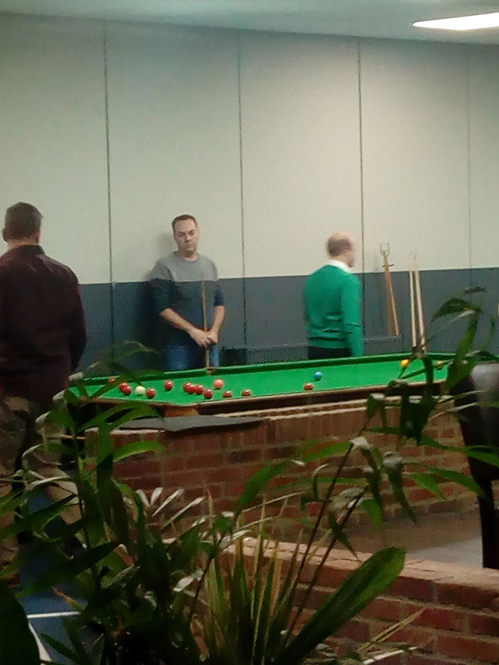 This Guy's Sweater Lines Up With The Wall