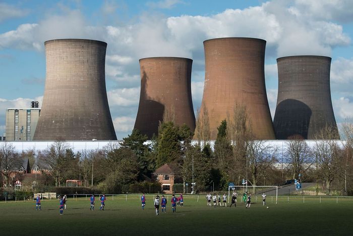A Power Plant And A Soccer Match Split Screen