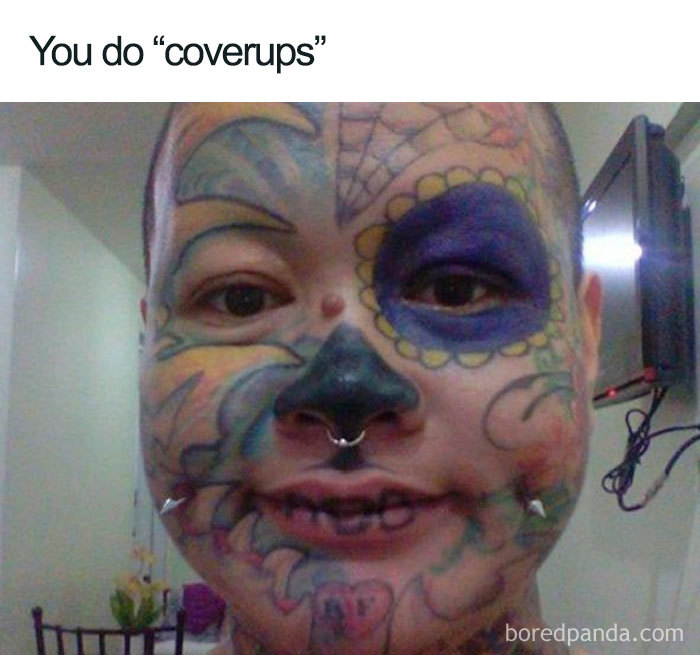 Person with colorful face tattoos and piercings, captioned "You do 'coverups'," as a humorous tattoo meme.