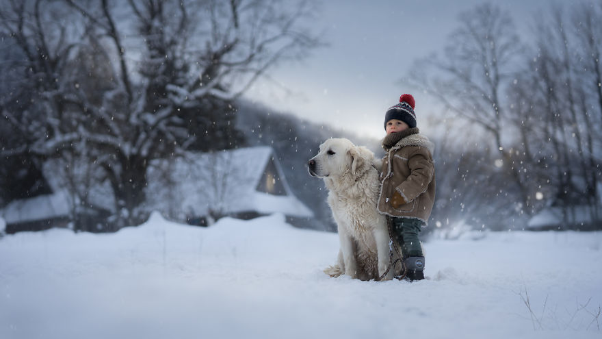 Kościelisko, Poland - A Boy With A Typical For This Region Of Poland Breed Of Dog