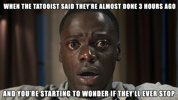 Man with teary eyes looking amazed, captioned with a tattoo meme about lengthy tattoo sessions.