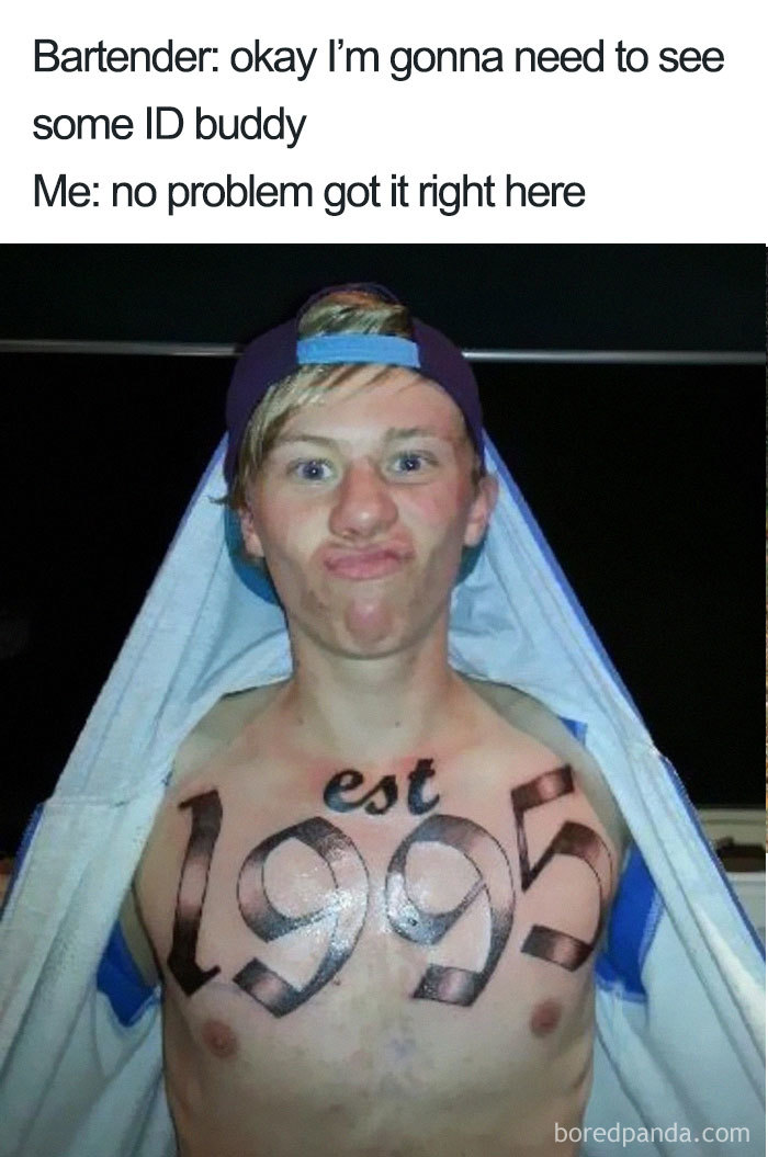 Man revealing chest tattoo "est 1995" in a humorous tattoo meme setting.