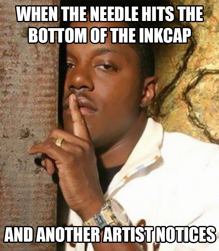 Man with finger over lips in a tattoo meme referencing inkcup mishaps.