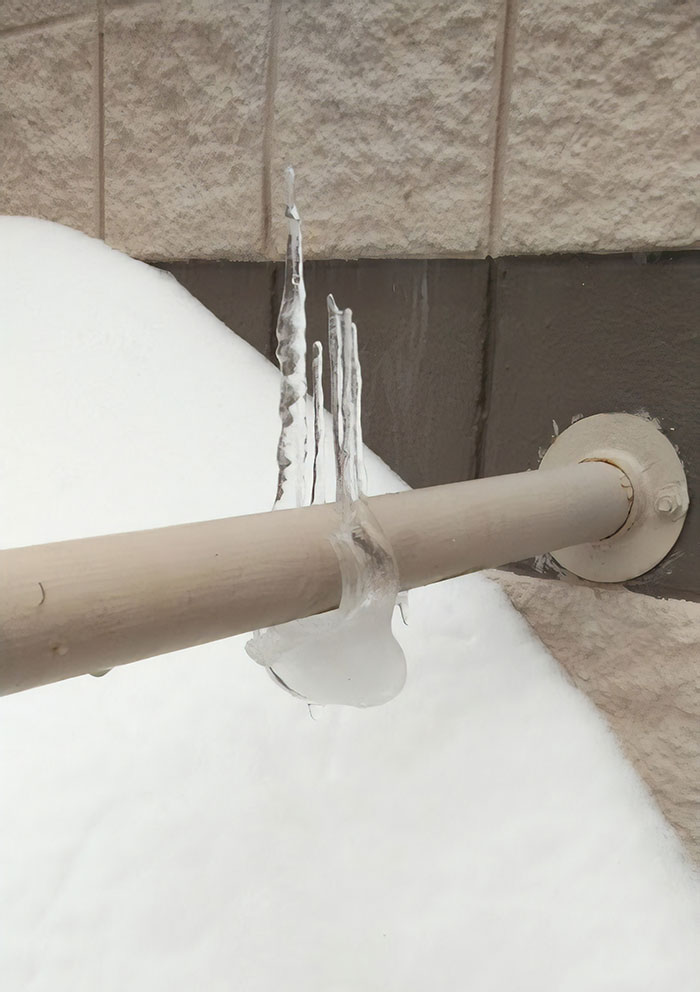 The Ice On This Railing Melted And Flipped Over