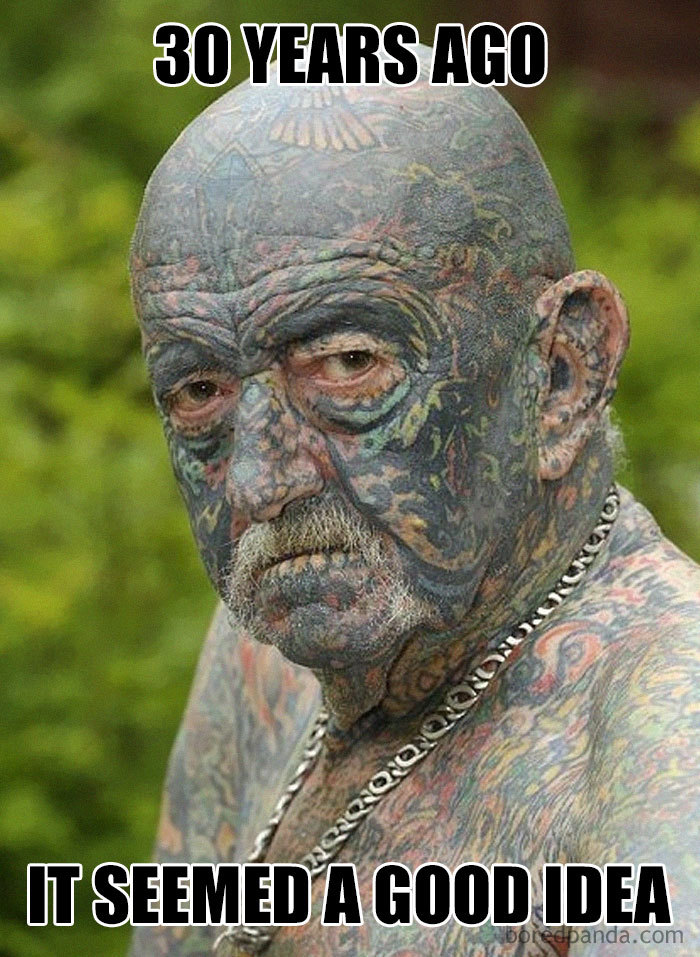 Heavily tattooed man with the text "30 years ago, it seemed a good idea," illustrating a tattoo meme.