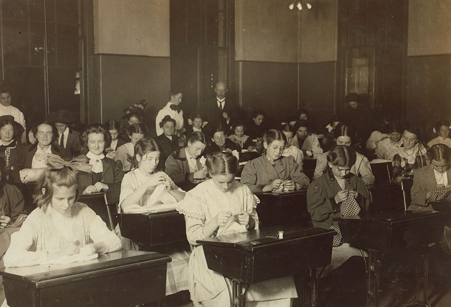Working Girls Learning Dressmaking In The Free Evening School. Location: Boston, Massachusetts
