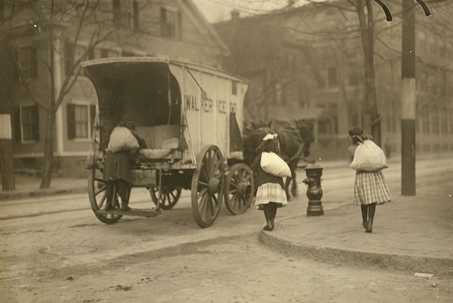 Girls Working On Ice Wagon. Location: New York, New York