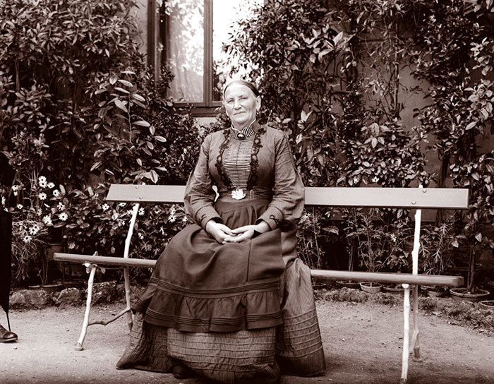 Mature Woman On Bench