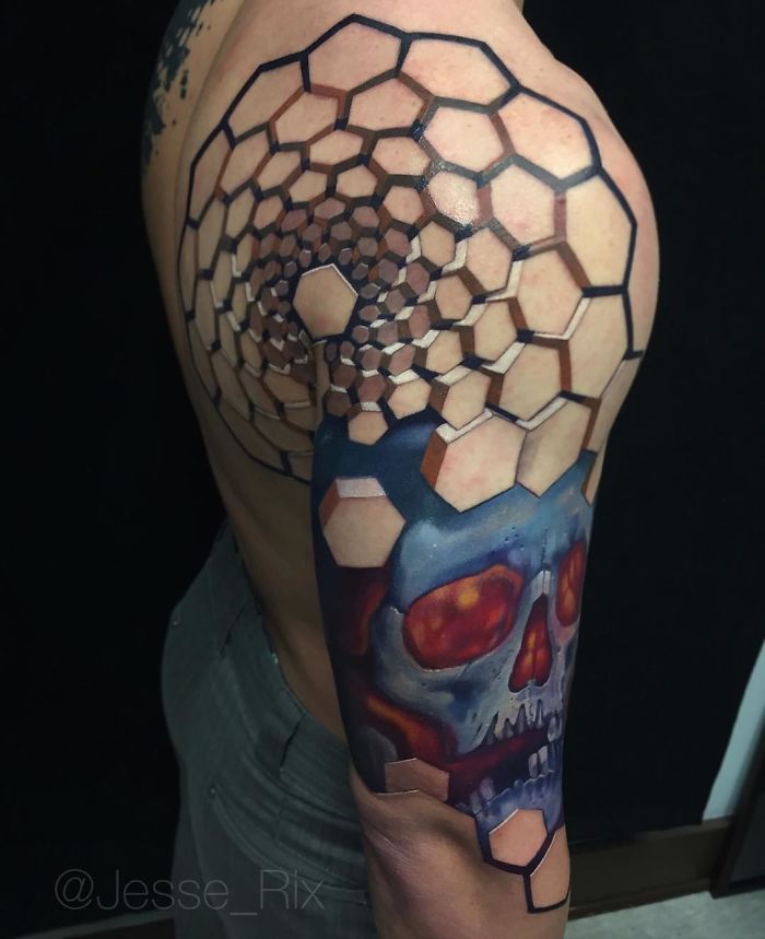 3D tattoo of hexagonal pattern and skull on upper arm, showcasing amazing artistic detail and realism.