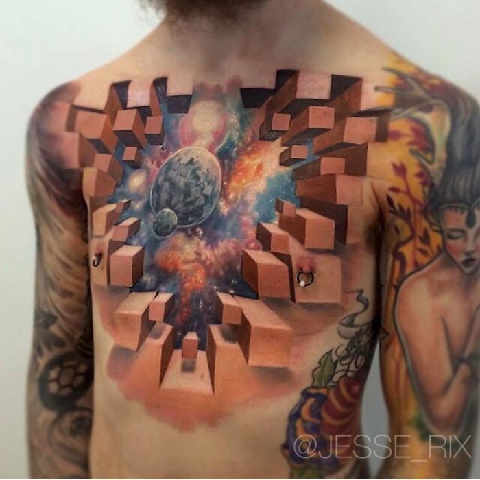 3D tattoo of a cosmic scene with planets and cubes on a person's chest, creating an optical illusion.