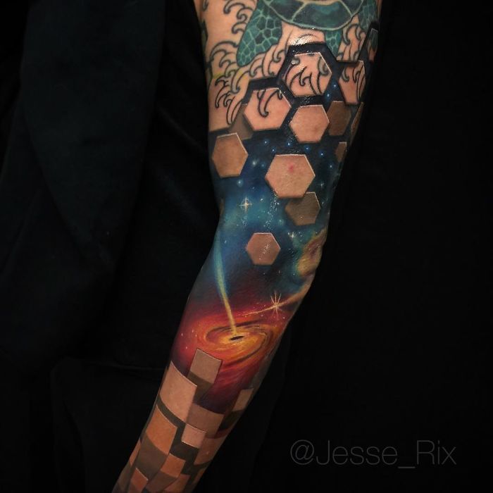 3D tattoo of geometric shapes and cosmos on arm, creating an illusion of depth and dimension.