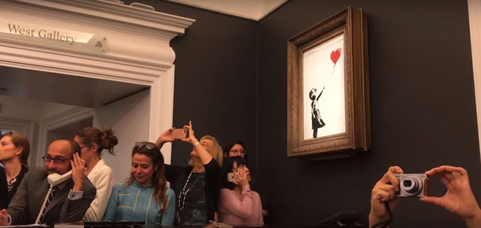 Banksy Artwork Shredded Itself Seconds After Being Sold For More Than 1 Million Dollars