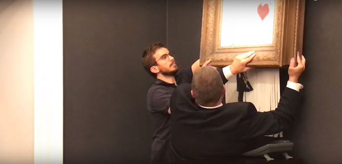 Banksy Artwork Shredded Itself Seconds After Being Sold For More Than 1 Million Dollars Banksy Artwork Shredded Itself Seconds After Being Sold For More Than 1 Million Dollars