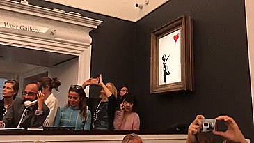 Banksy Artwork Shredded Itself Seconds After Being Sold For More Than 1 Million Dollars