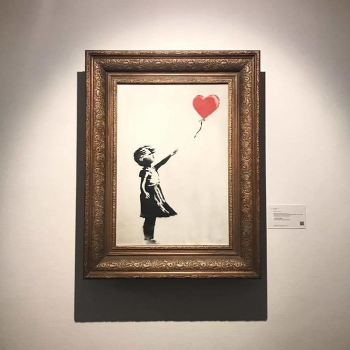 Banksy Artwork Shredded Itself Seconds After Being Sold For More Than 1 Million Dollars Banksy Artwork Shredded Itself Seconds After Being Sold For More Than 1 Million Dollars