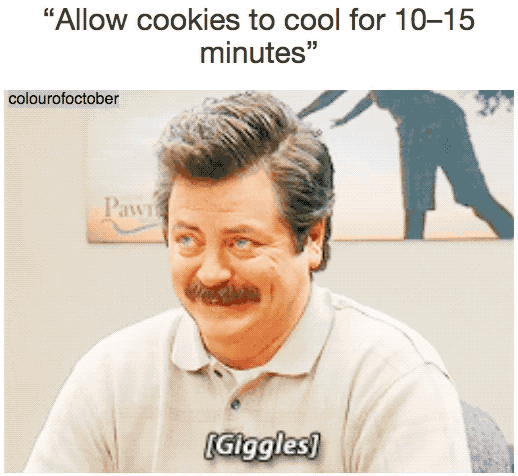 Man giggling at a food meme about letting cookies cool for 10-15 minutes.
