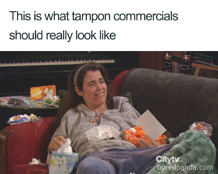 Woman on couch covered in snacks, representing period mood humor.