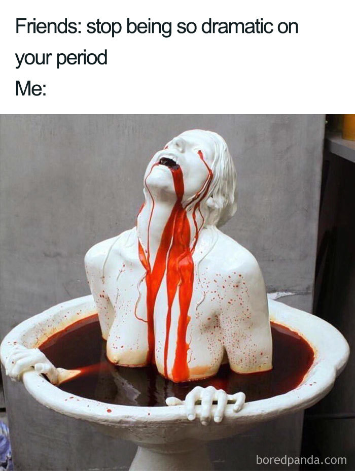 Sculpture in a fountain with a dramatic expression, depicting an exaggerated reaction to menstruation.