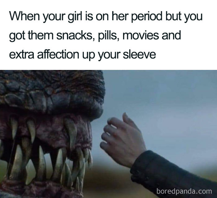 Close-up of a hand reaching toward a dinosaur's mouth, with a meme text about period support above.