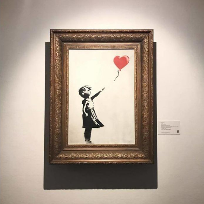Banksy Artwork Shredded Itself Seconds After Being Sold For More Than 1 Million Dollars