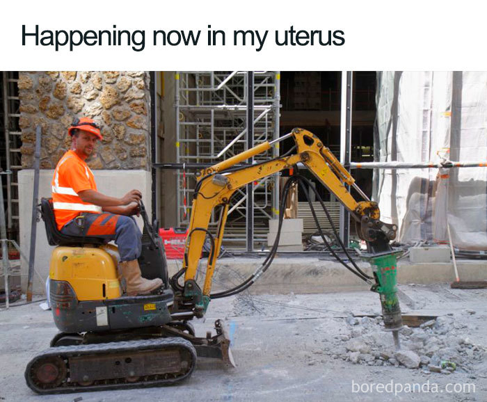Construction worker using a jackhammer with text above: "Happening now in my uterus." Period meme humor.