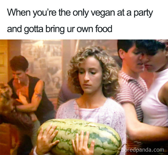 Vegan meme with a woman holding a watermelon at a party, highlighting a humorous take on being vegan.