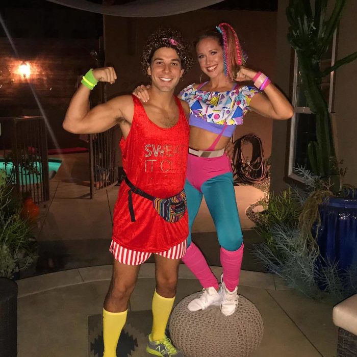 Skylar Astin And Anna Camp As Richard Simmons And Someone Taking One Of His Workout Classes