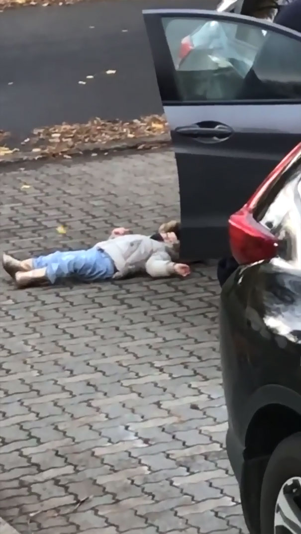 Mom Can&rsquo;t Hold Back Laughter Filming Dad Carry Their Stubborn Child Inside Like A Duffle Bag