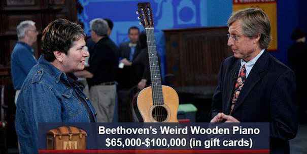 Hilarious captions on Antiques Roadshow item, showing two people discussing a guitar labeled as "Beethoven's Weird Wooden Piano."