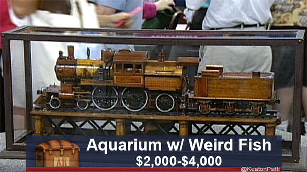 Antiques Roadshow item with hilarious caption: "Aquarium w/ Weird Fish," valued at $2,000-$4,000.