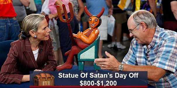 Two people discussing an Antiques Roadshow item, a whimsical "Statue of Satan's Day Off," valued at $800-$1,200.