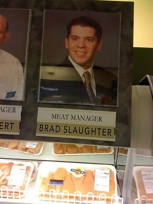 Meat manager portrait with name, above meat display, fitting job name humorously.