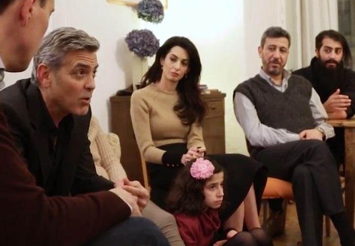In March 2016, He And His Wife, Amal Clooney, Met With Syrian Refugees Living In Berlin To Mark The Fifth Anniversary Of The Conflict, Before Meeting With German Chancellor Angela Merkel To Thank Her For Her Germany's Open-Door Policy
