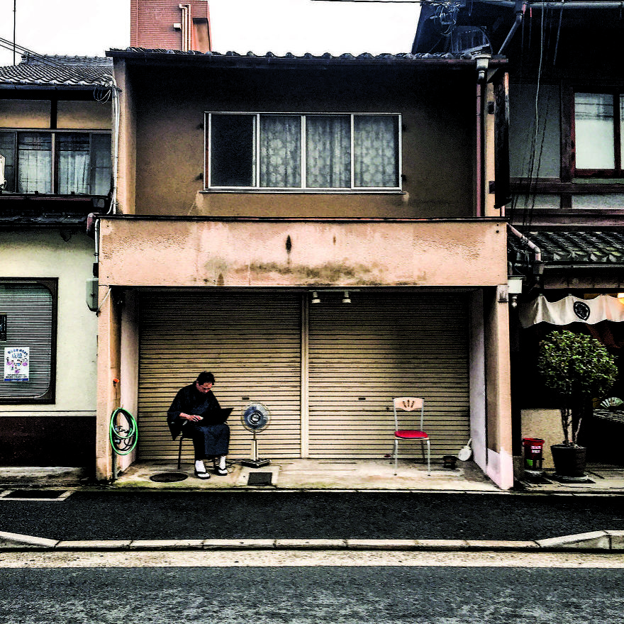 Gion Festival Participant Takes A Break From The Heat