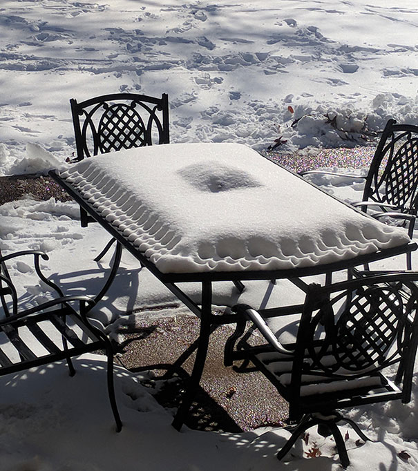 The Snow On This Patio Table Looks Like A Pastry Pie