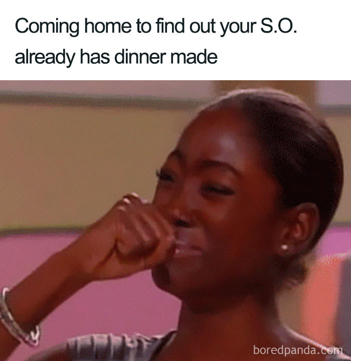 Woman emotional and smiling after seeing wholesome relationship gesture from significant other.