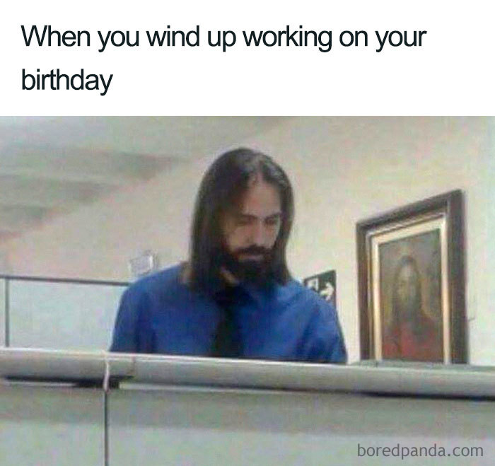 Man in office cubicle looking disappointed. Text above reads “When you wind up working on your birthday."