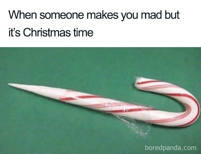 Bent candy cane as a Christmas meme joke about anger and holiday season.