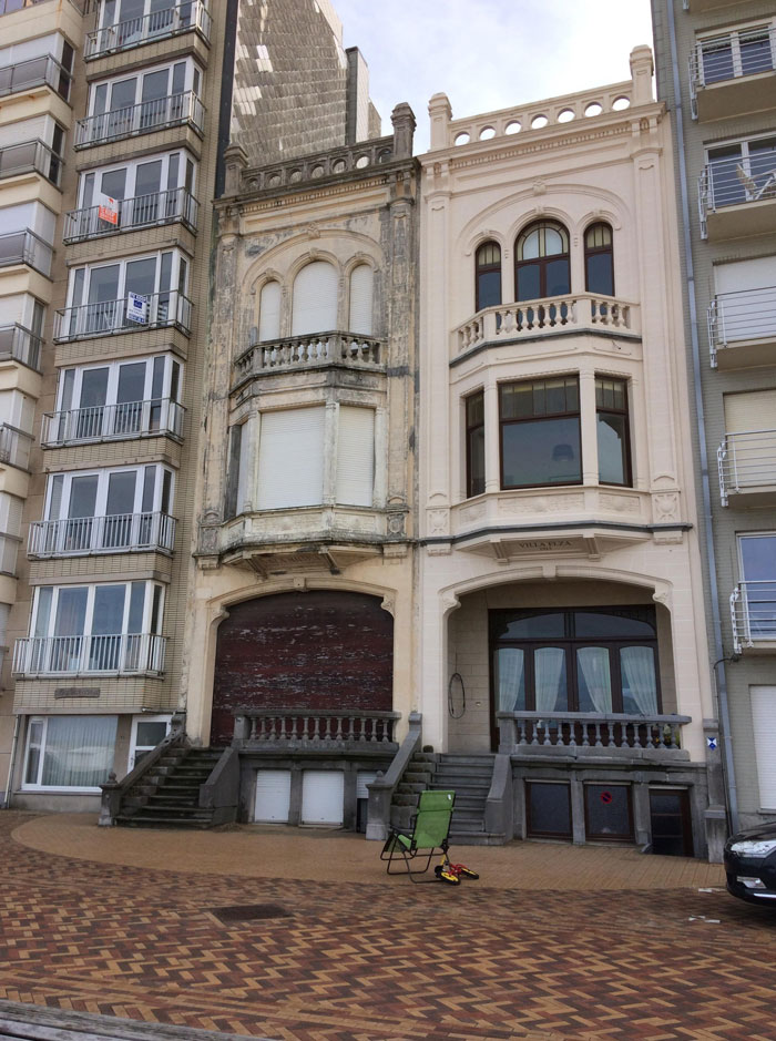 Two Identical Buildings: One Renovated, The Other Not