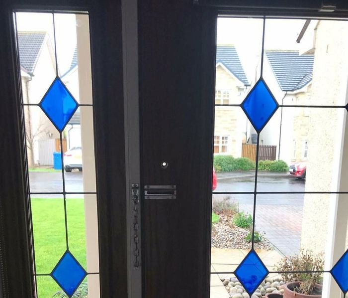 This Peephole In A Glass Door