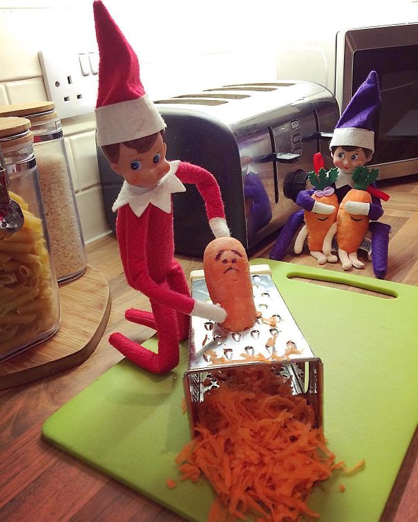 "Elf On The Shelf idea with the elf grating a carrot with a scared face, while other carrots watch in shock from the side."