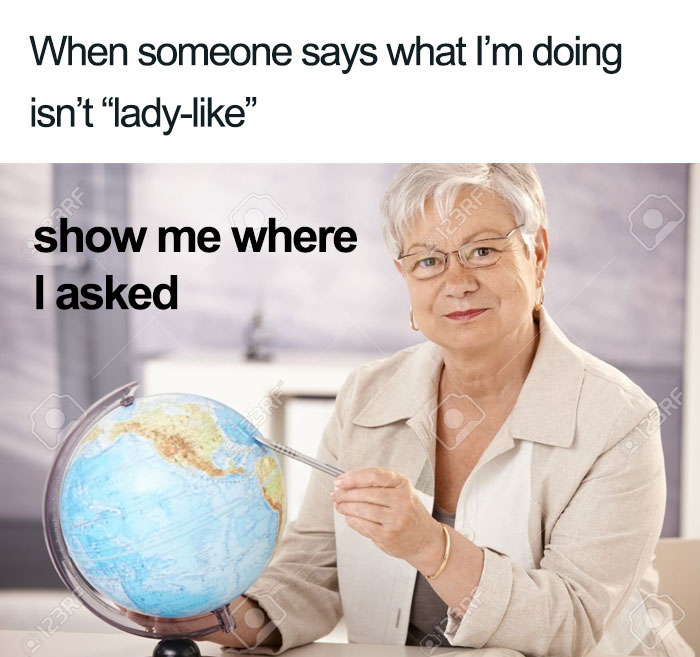 An older woman humorously points at a globe with text on feminist humor.