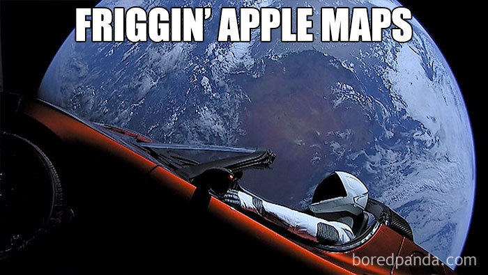 Astronaut in a space suit humorously depicted in a car orbiting Earth, with text about Apple Maps.