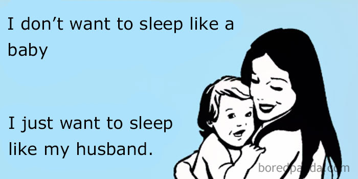 Mom meme with a cartoon woman holding a baby, text reads, "I don’t want to sleep like a baby, I just want to sleep like my husband."
