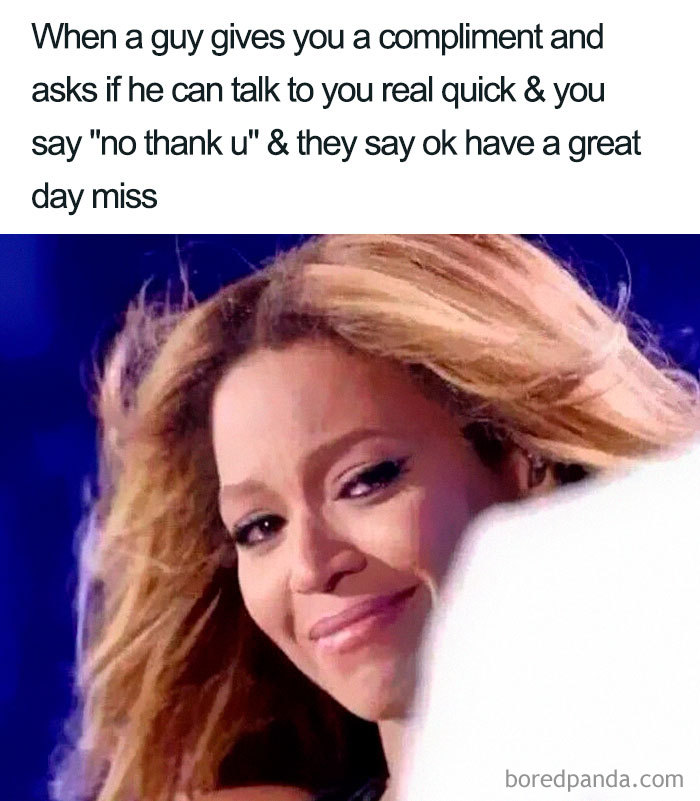 A woman smiling with caption on humorous feminist meme about handling unwanted compliments.