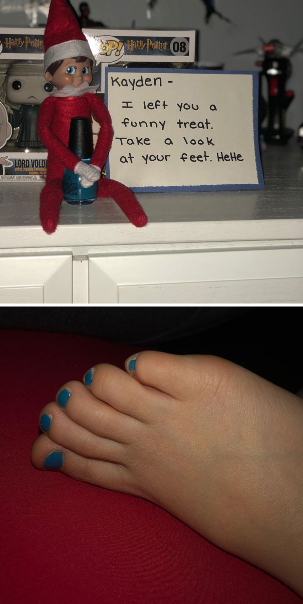 "Elf On The Shelf idea with the elf holding nail polish next to a note saying, 'Take a look at your feet,' and toes painted blue shown below."