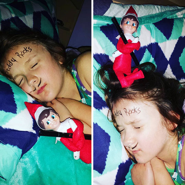  "Elf On The Shelf idea with the elf holding a marker beside a sleeping child, with 'Freddy Rocks' written on the child's forehead and a mustache drawn."