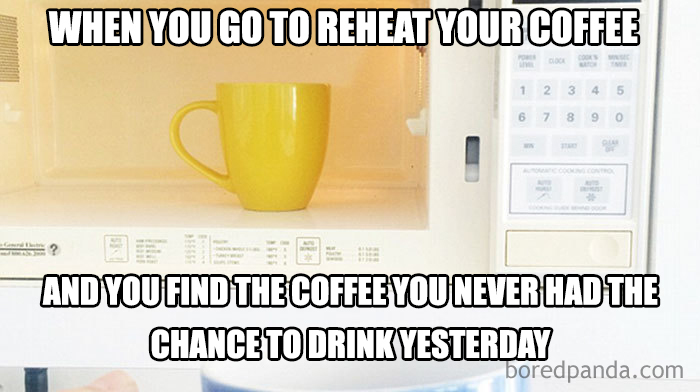 Funny mom meme about reheating forgotten coffee in a yellow mug inside a microwave.