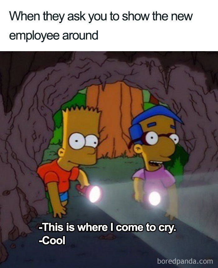 Cartoon characters holding flashlights in a cave, joking about office life.